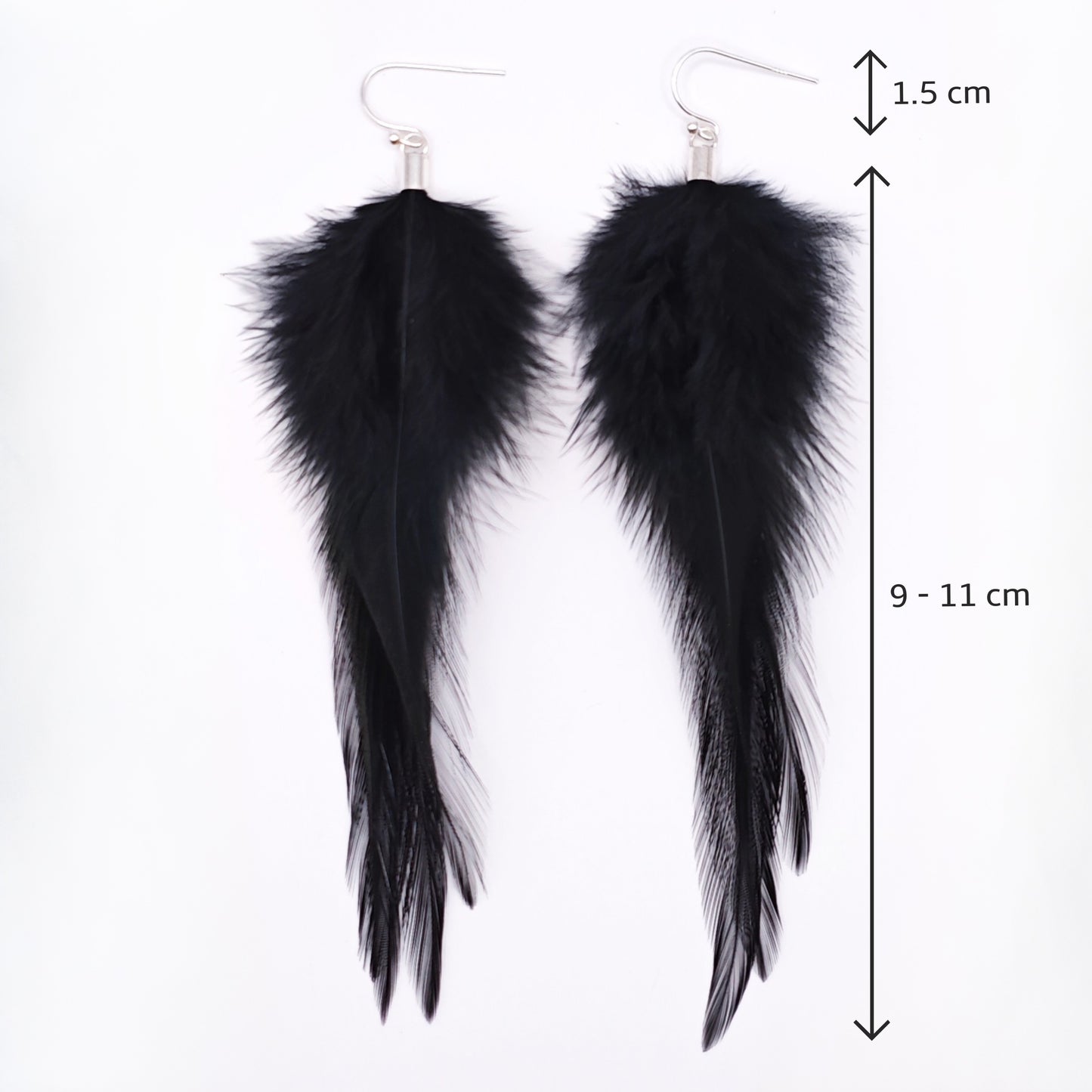 Black feather earrings with measurements on a white background