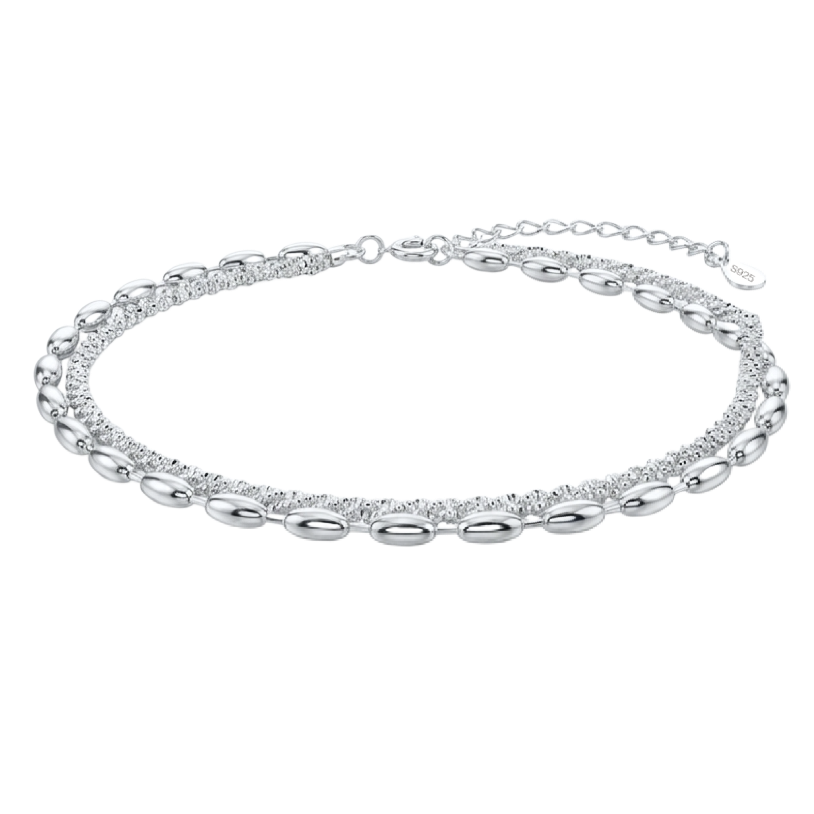 925 Silver Bracelet featuring a double chain, one twisted sparkle chain and one with oval beads, on a white background