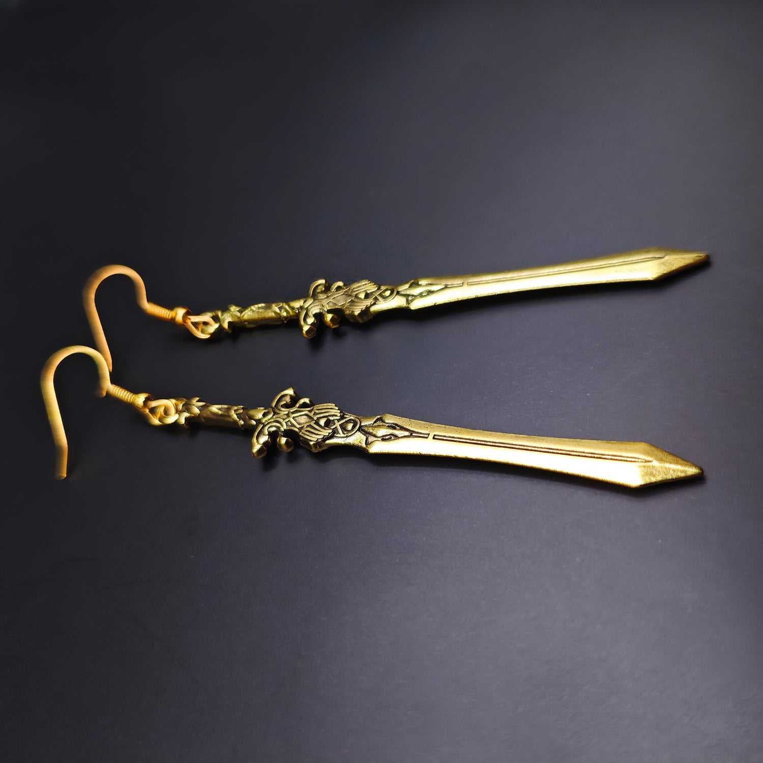 Long sword earrings in a medieval style
