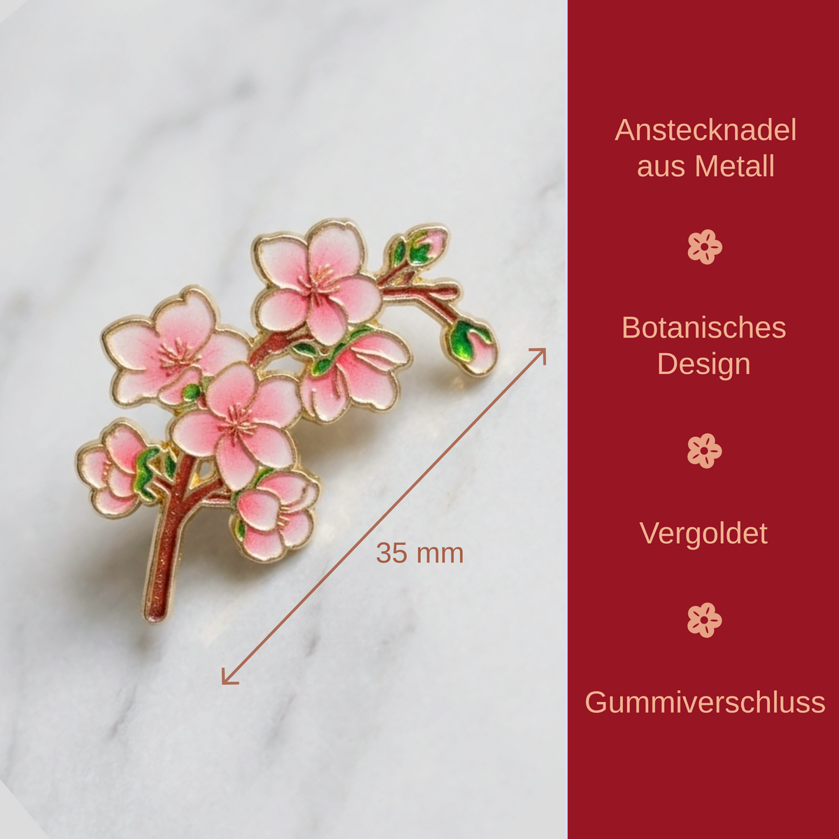 A pink cherry blossom enamel pin with gold-tone metal trim and green leaf accents, shown on a white marble background with a red side panel containing German text and a 35 mm dimension marker.