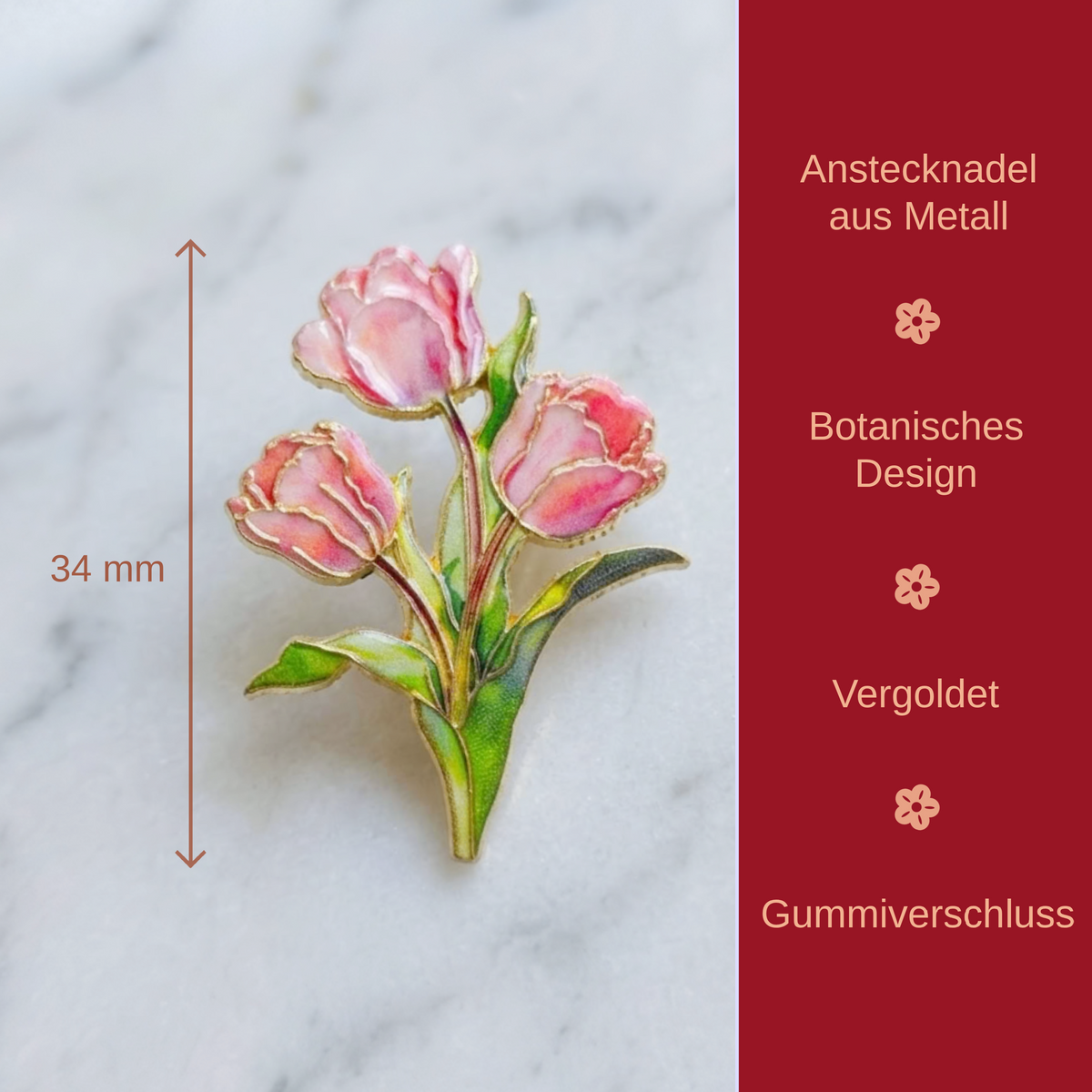 A pink and green enamel tulip flower brooch with gold trim, shown on a white marble surface with a red side panel containing German text and a 34 mm size marker.
