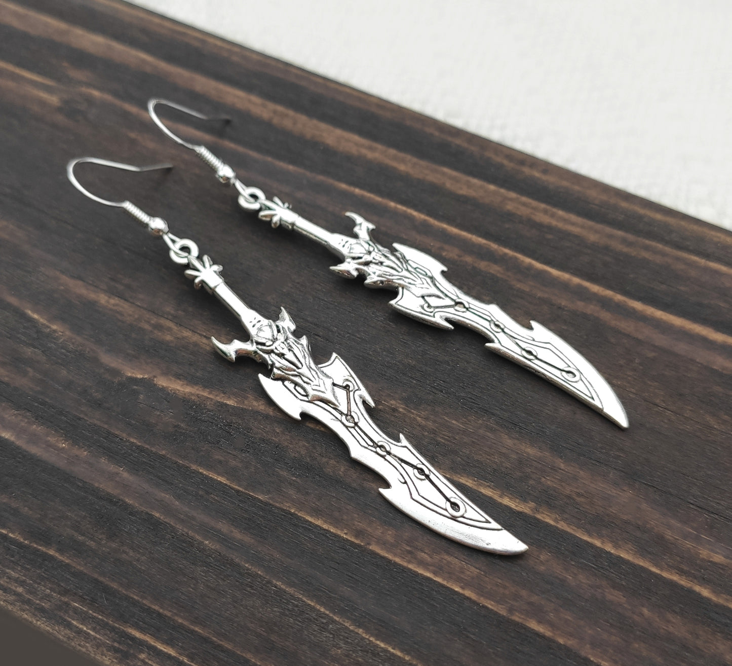 Lightweight long sword earrings made of alloy and stainless steel, ideal for anime costumes, gift for gamers or larping.