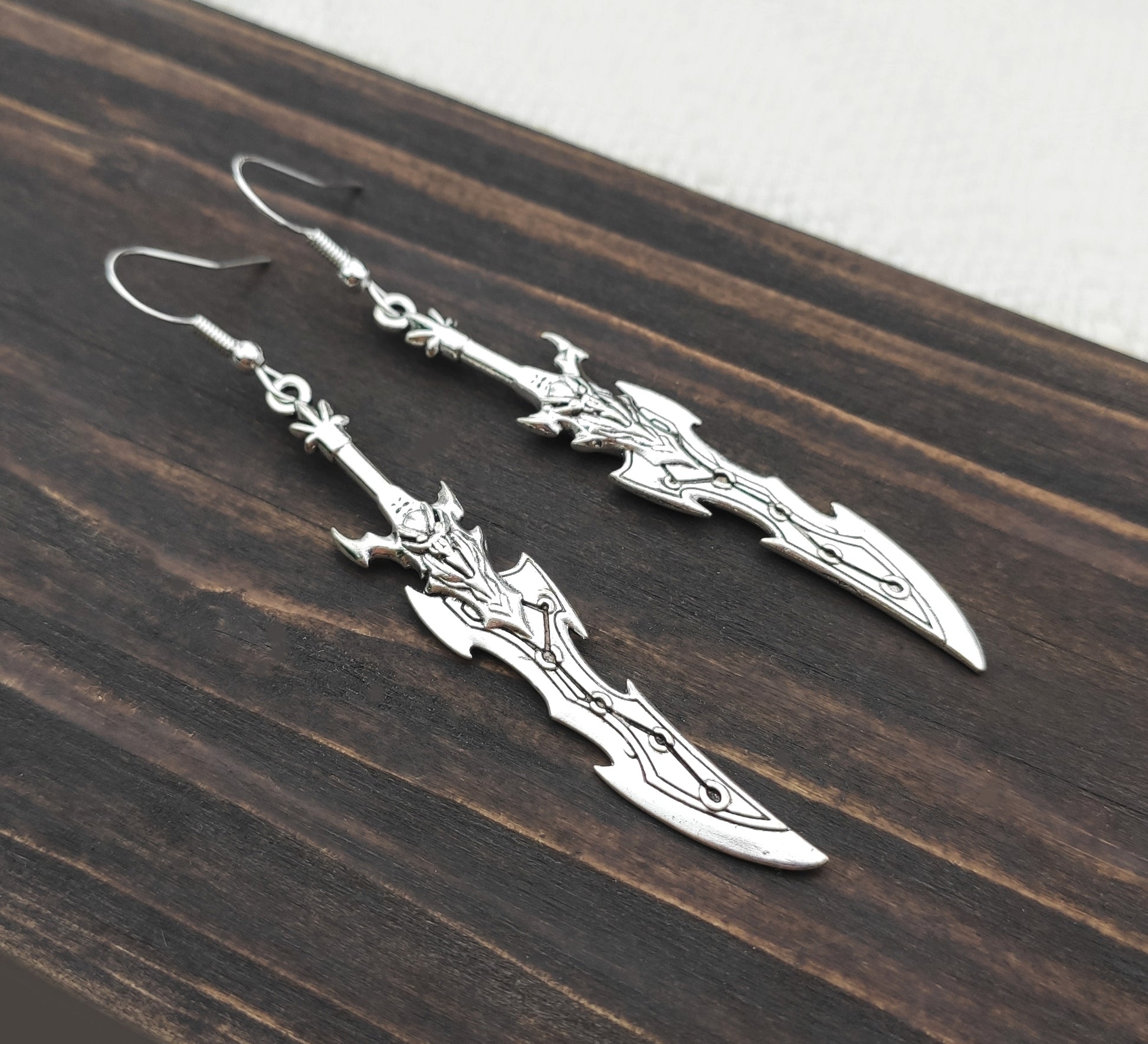 Lightweight long sword earrings made of alloy and stainless steel, ideal for anime costumes, gift for gamers or larping.