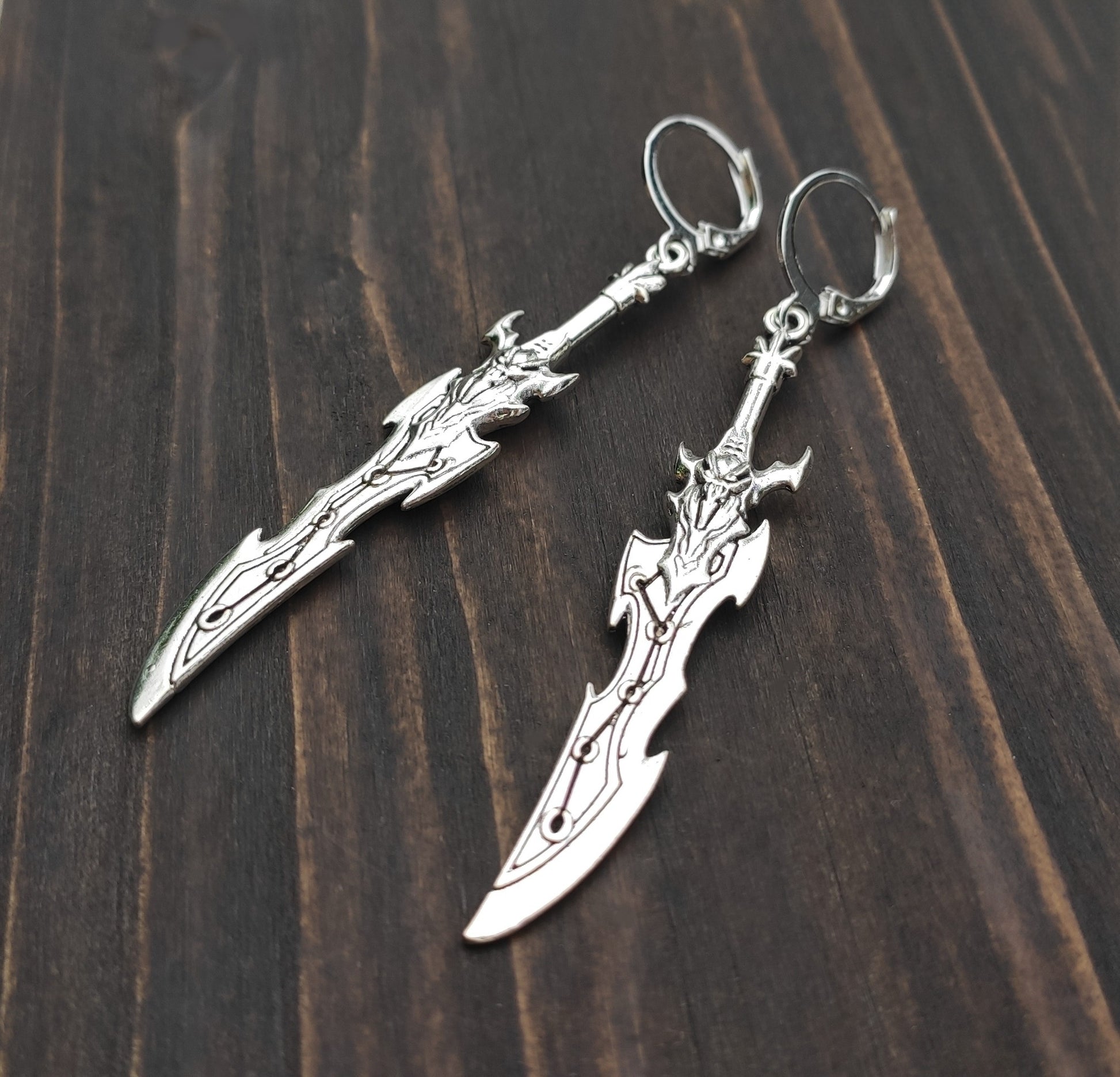 Lightweight long sword earrings made of alloy and stainless steel, ideal for anime costumes.