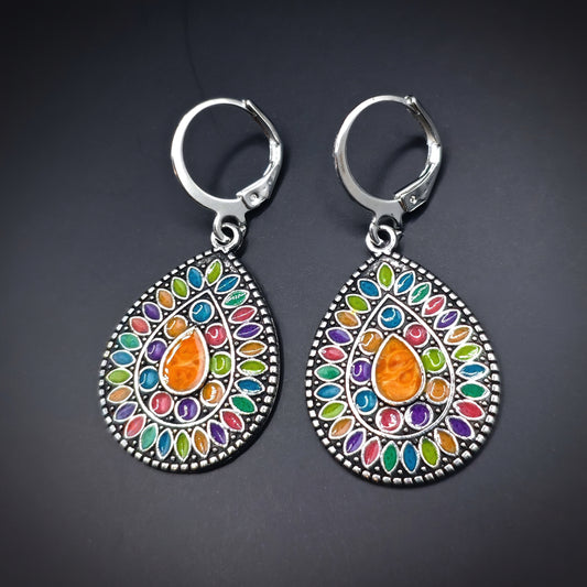 Colorful drop earrings with teardrop-shaped multicolored enamel designs. Ethnic boho hippie style 