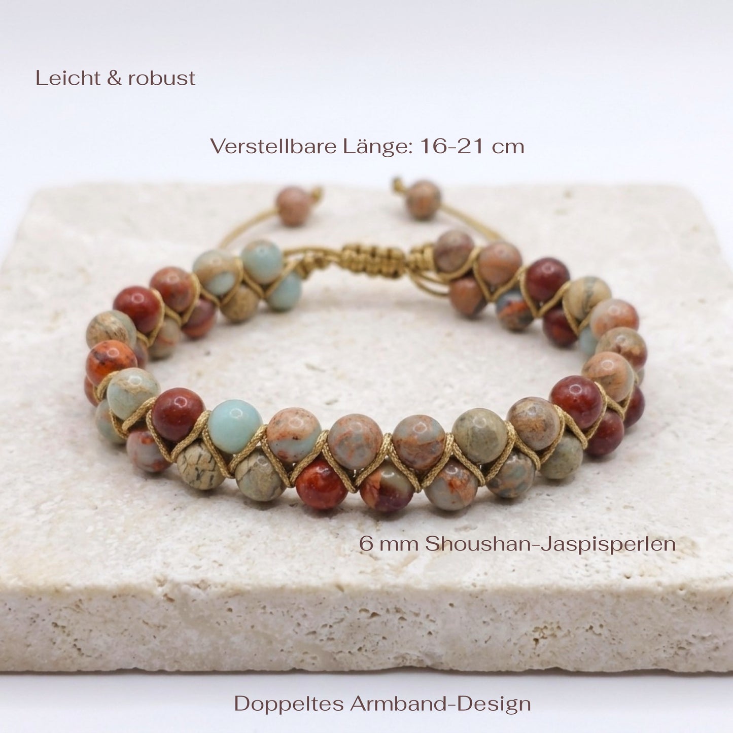 Shoushan Jasper bead bracelet with a double layer of beads, woven together and an adjustable bolo drawstring. the beads are blue, red and beige with patterns. The natural gemstone bracelet is on a light stone background with measurements.