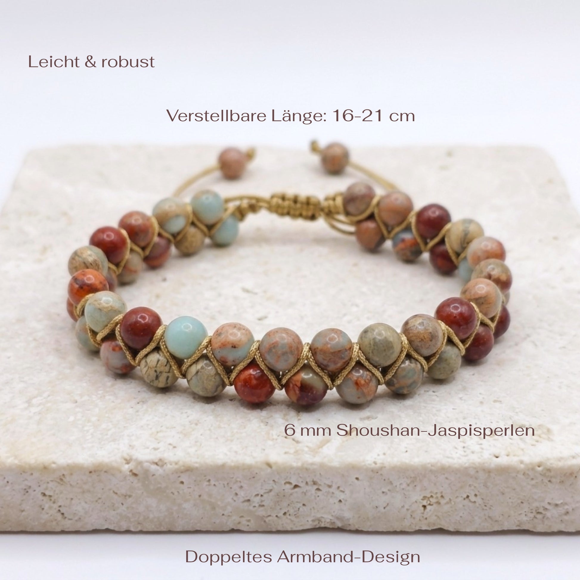 Shoushan Jasper bead bracelet with a double layer of beads, woven together and an adjustable bolo drawstring. the beads are blue, red and beige with patterns. The natural gemstone bracelet is on a light stone background with measurements.