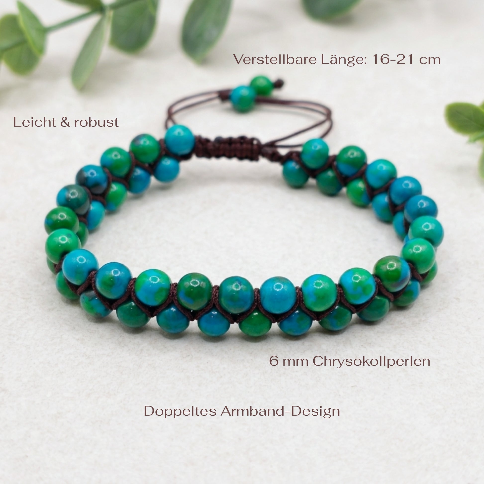Chrysocolla bead bracelet featuring a double row of green and blue beads woven together with a brown cord and adjustable bolo drawstring. The natural colourful gemstone bracelet sits on a light stone background with measurements