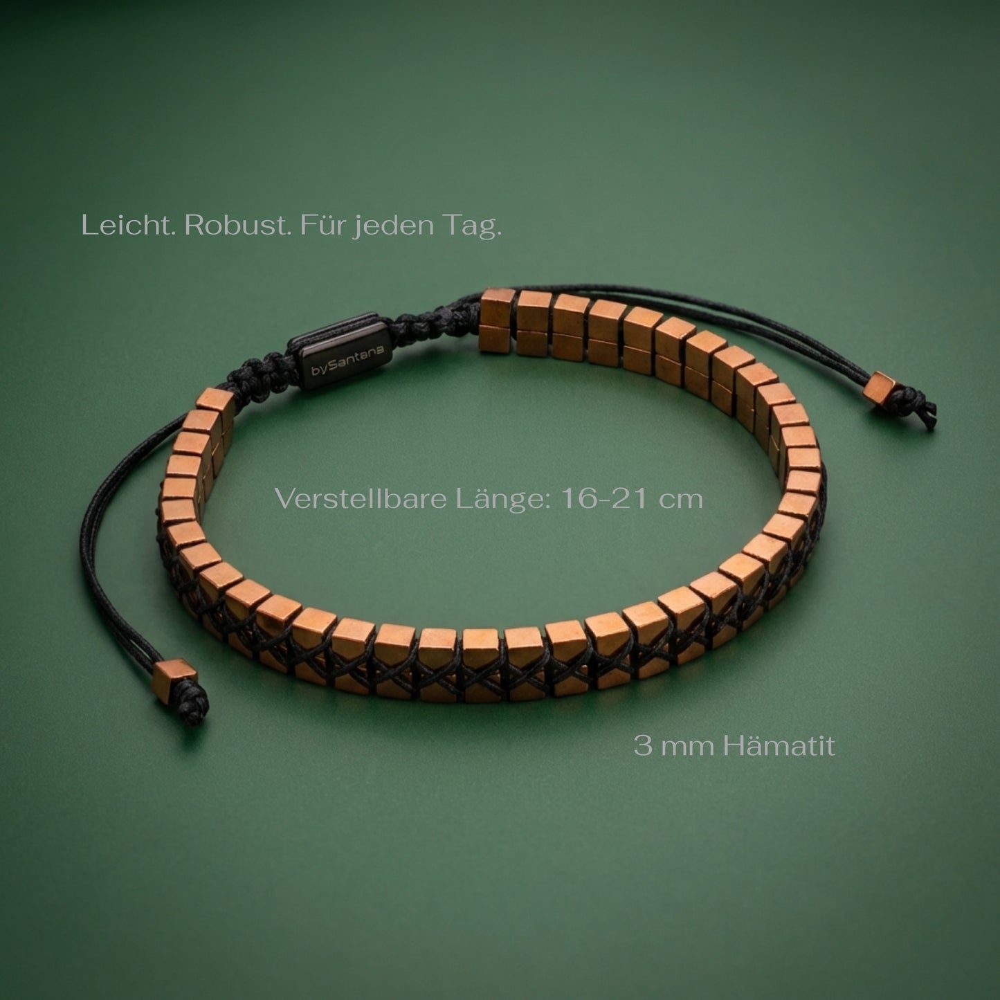 Men's hematite bracelet with copper cube beads woven together and an adjustable cord, on a green background with measurements