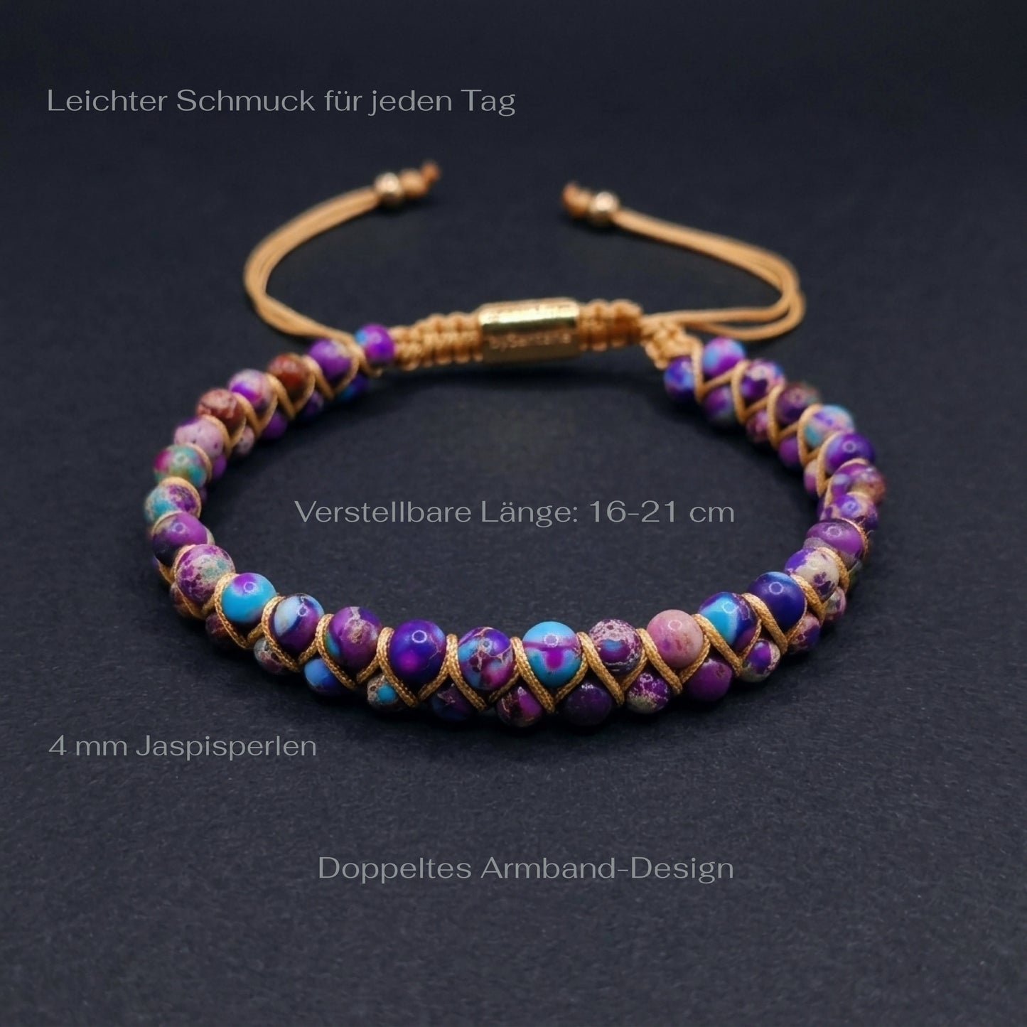 Galaxy sea sediment jasper bead bracelet on a dark surface with measurements. The colorful purple and blue gemstone beads are woven into a double row with an adjustable drawstring clasp.