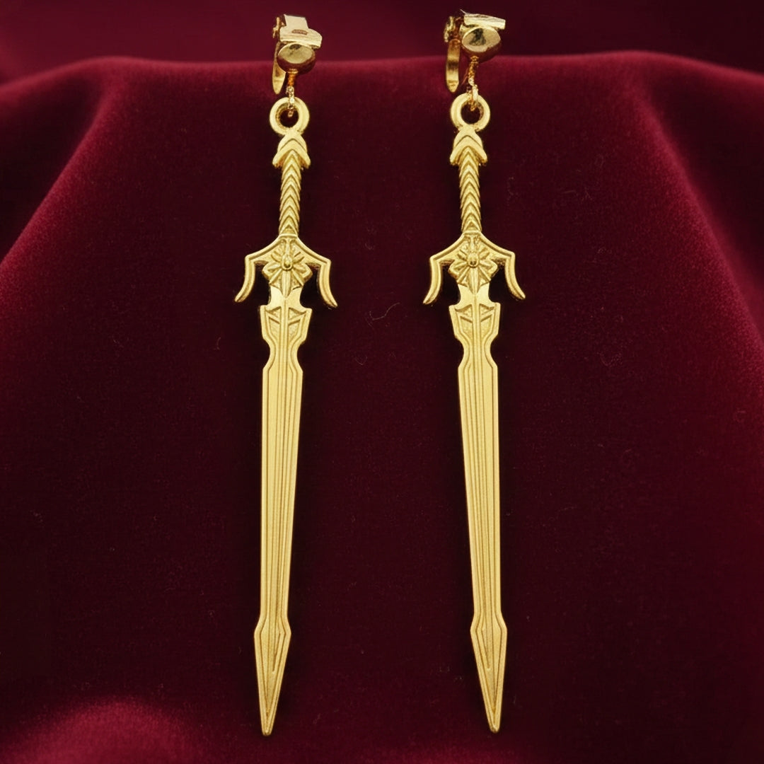 Medieval style fantasy long gold sword earrings with clip-on earrings on a red background