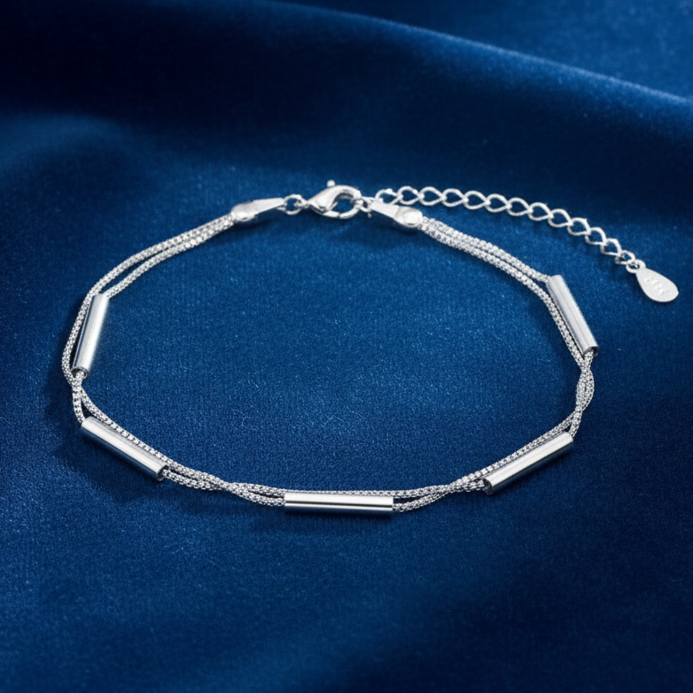 925 Silver Bracelet featuring two Venetian box chains and long silver beads on a blue background