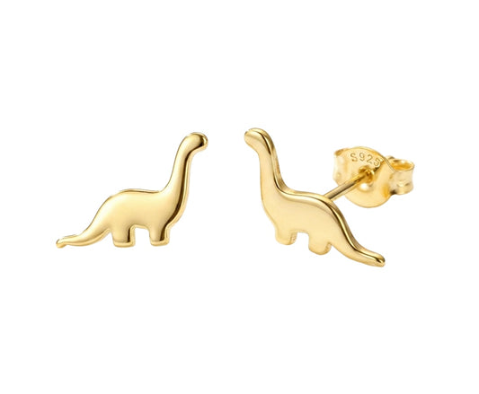 Gold dinosaur-shaped earrings on a white background
