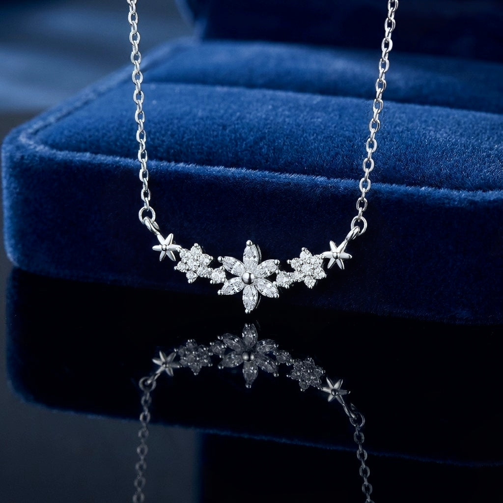 Dainty flower pendant made with 925 sterling silver, on a blue background