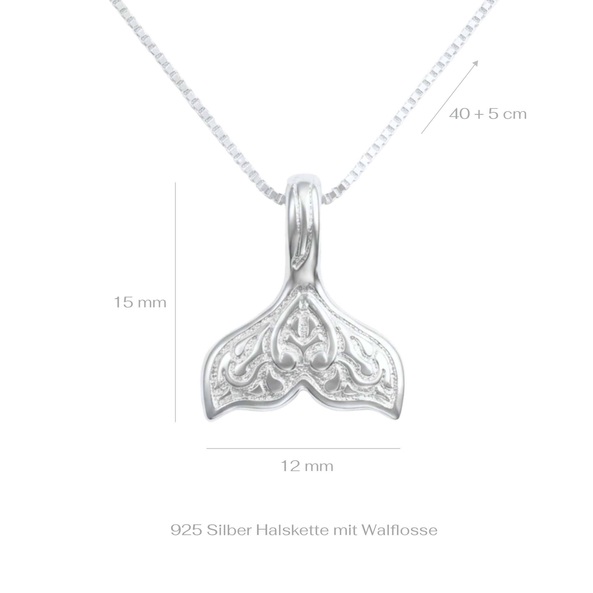 A silver whale tail necklace on a white background with measurements