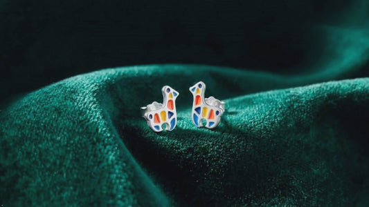 Product overview of silver llama alpaca stud earrings