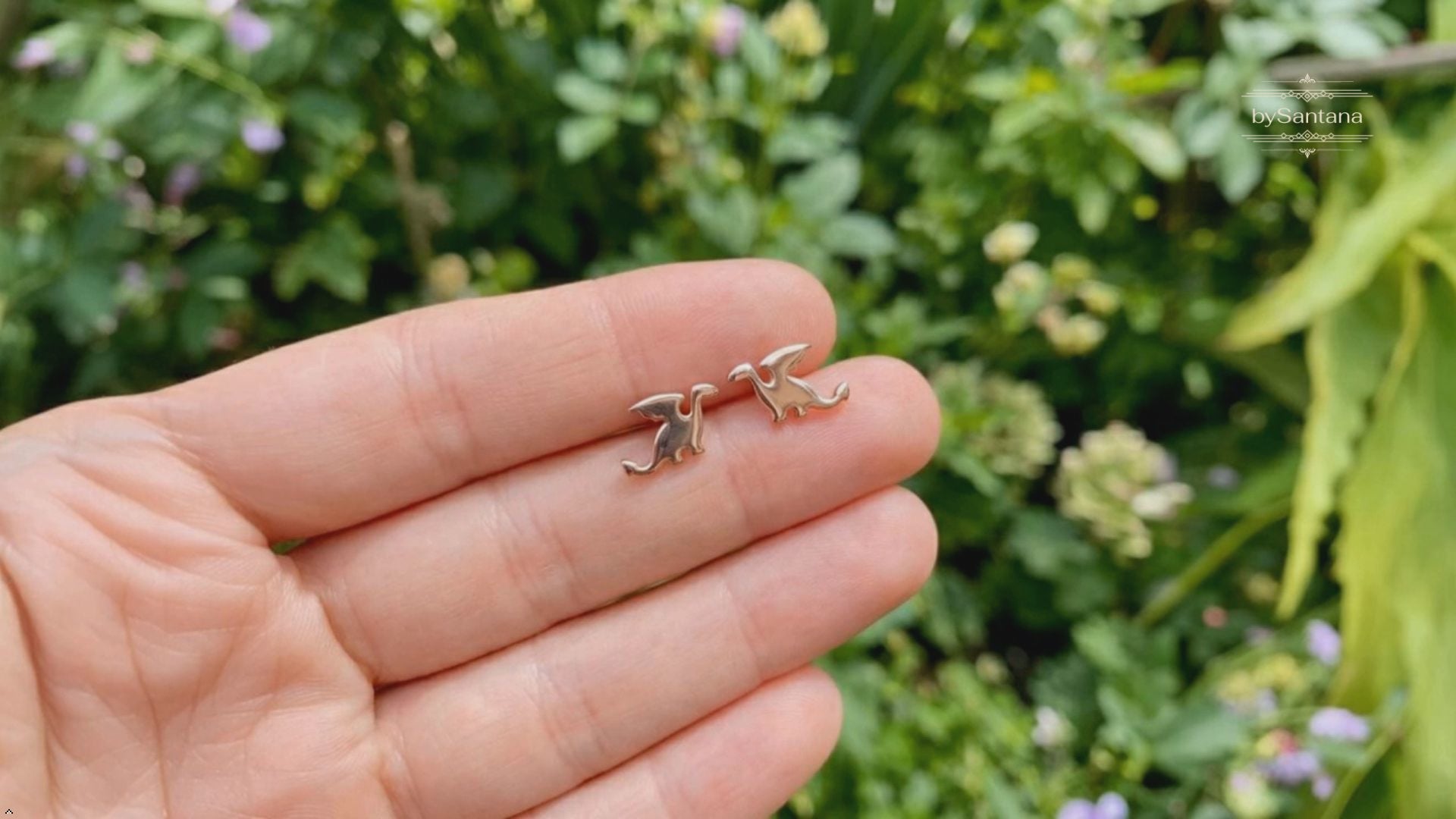 Product overview of silver dragon stud earrings in rosegold